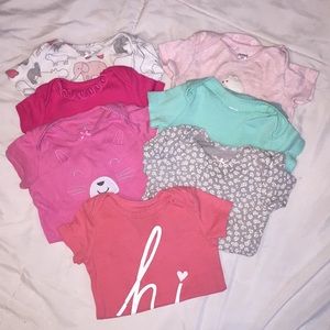Seven Short Sleeved Onesies